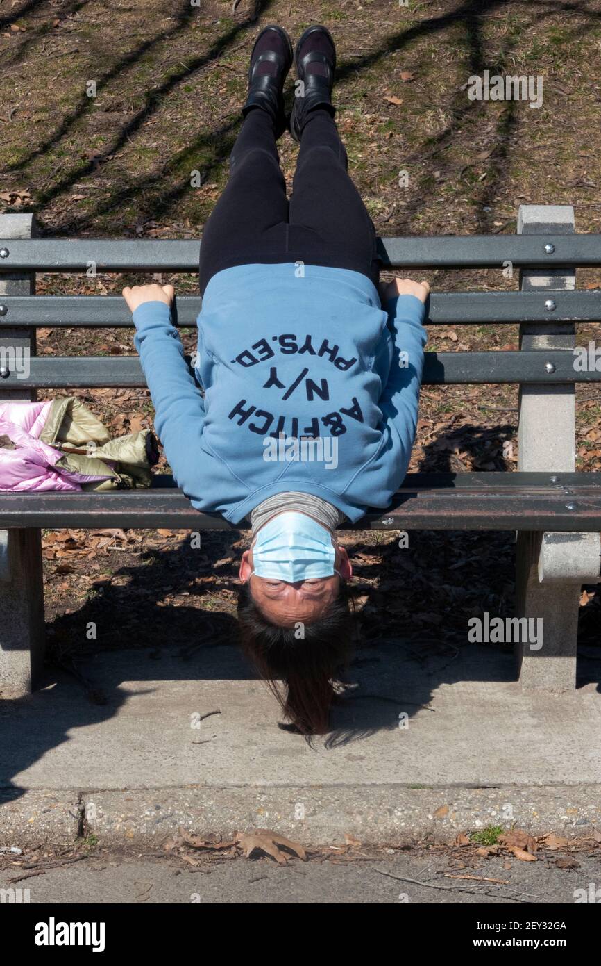 Woman hanging upside down hi-res stock photography and images - Alamy
