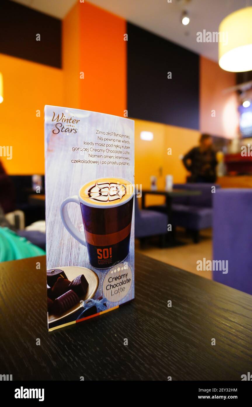 POZNAN, POLAND - Dec 01, 2013: So Coffee coffee card on a table in a cafe Stock Photo