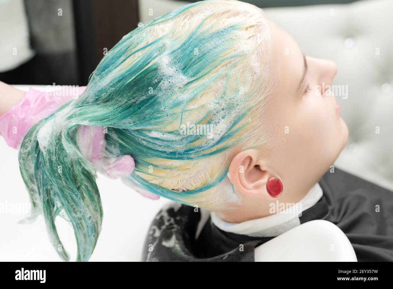 Woman lather shampoo hi-res stock photography and images - Alamy