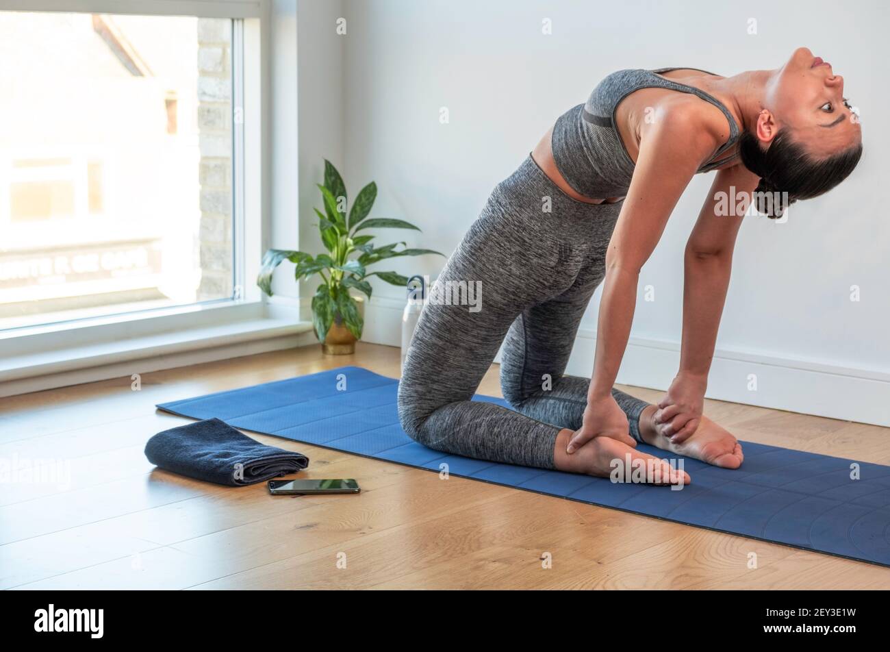 Slim pretty woman stretching hi-res stock photography and images - Alamy