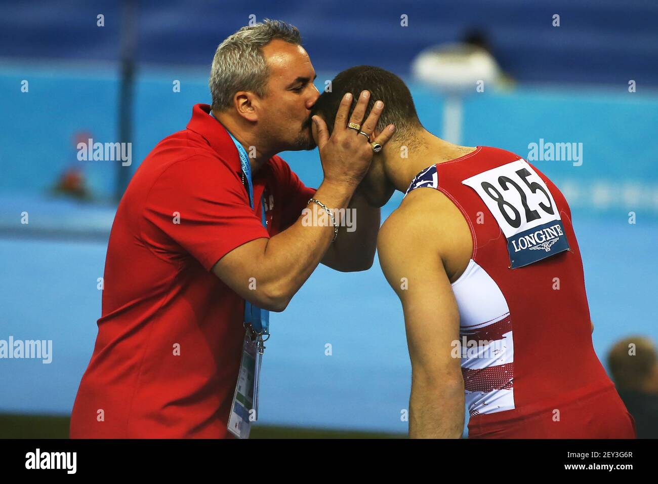 october-7-2014-nanning-chinadanell-leyva-gets-a-good-luck-kiss-from-his-coach-and-father-yin-alvarez-before-he-competes-during-the-mens-team-final-competition-of-the-fig-artistic-gymnastics-world-championships-in-nanning-china-team-usa-won-the-bronze-medal-china-won-the-team-event-and-japan-took-silver-photo-by-melissa-j-perensoncsmsipa-usa-2EY3G6R.jpg