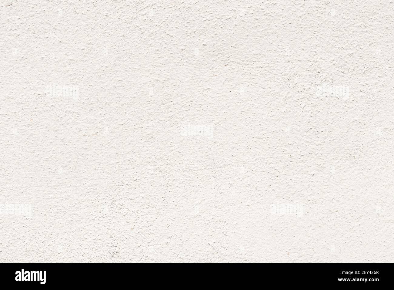 Blank concrete white rough wall for background. Beautiful white cement wall plastered surface background pattern. Stock Photo