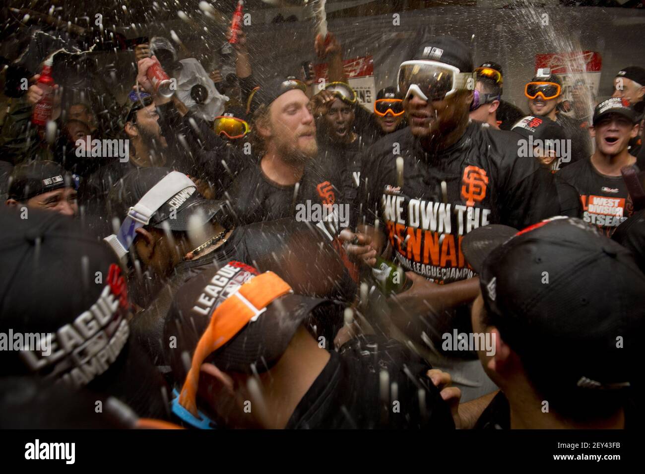 The San Francisco Giants' Hunter Pence leads the team in a cheer during the  celebration in the locker room following a series-clinching 6-3 win in Game  5 of the National League Championship