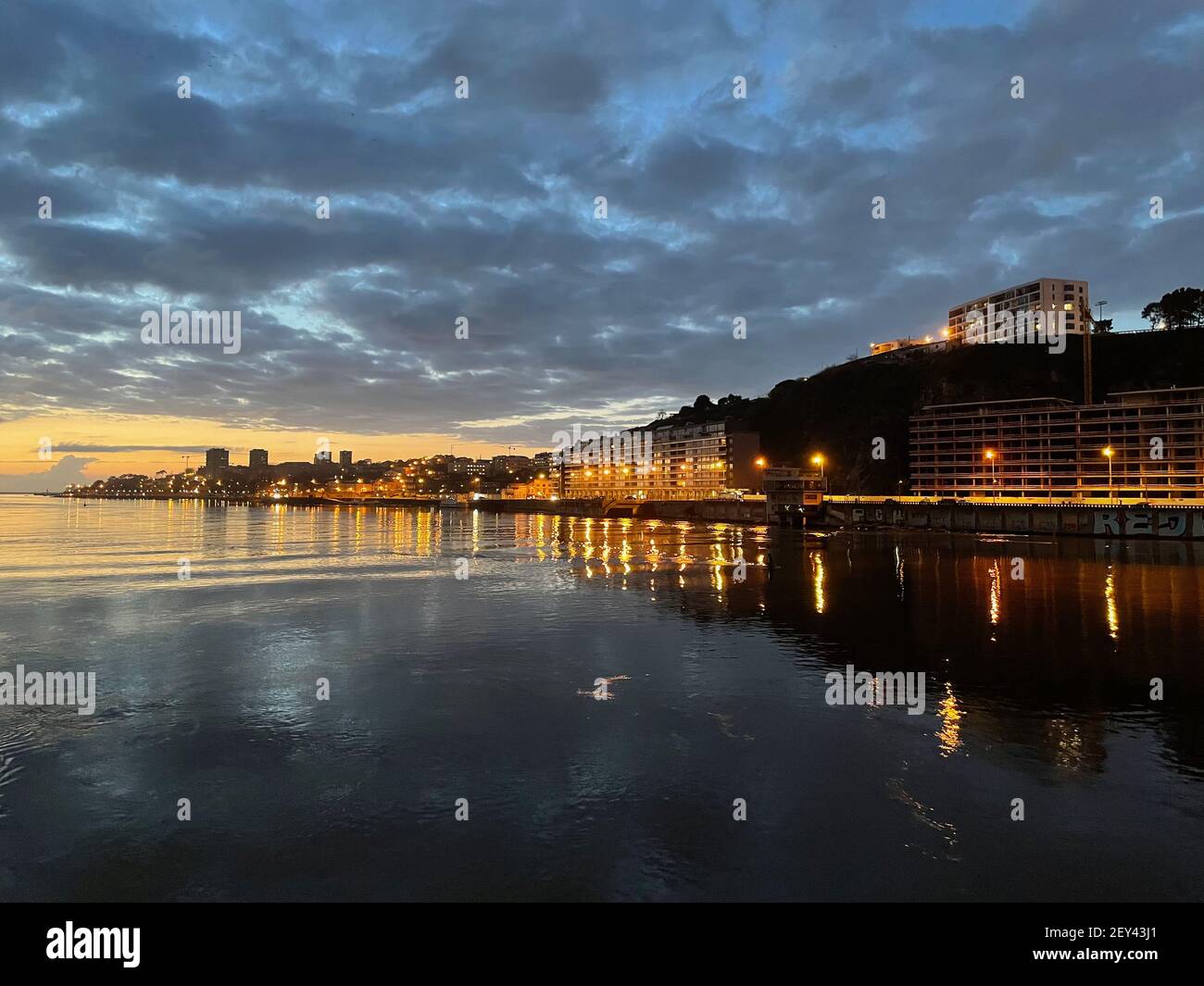 Vista da Ponte da Arrábida com o pôr-do-sol ao fundo. Postal do Porto. Stock Photo
