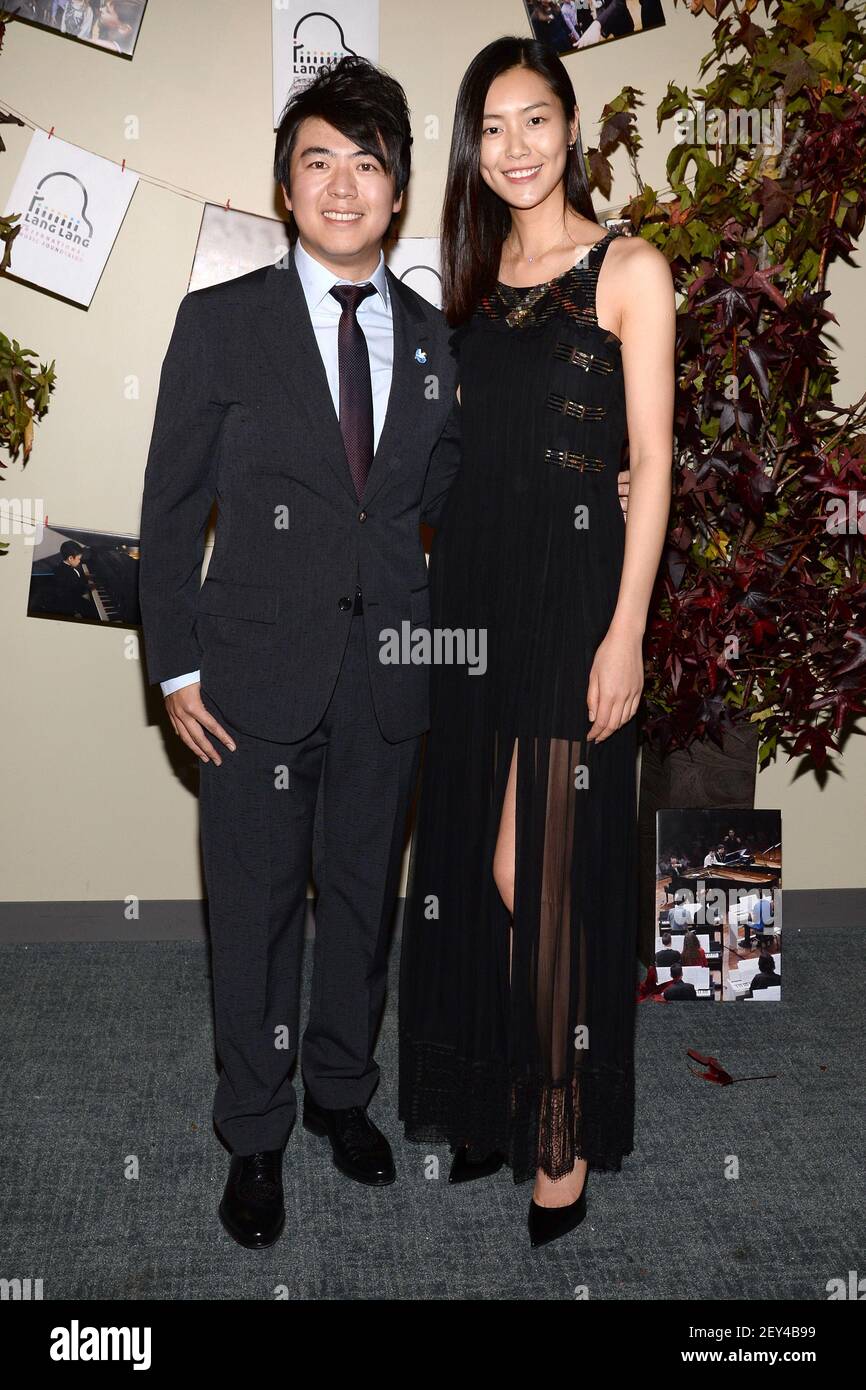(LR) Pianist Lang Lang and model Wen Liu attend Lang Lang