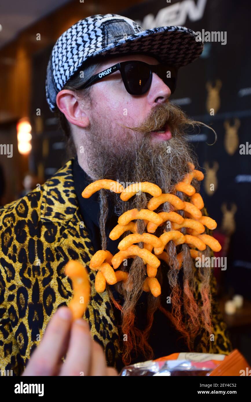 James Lewis poses with his Cheetos beard at the 2014 World Beard and ...
