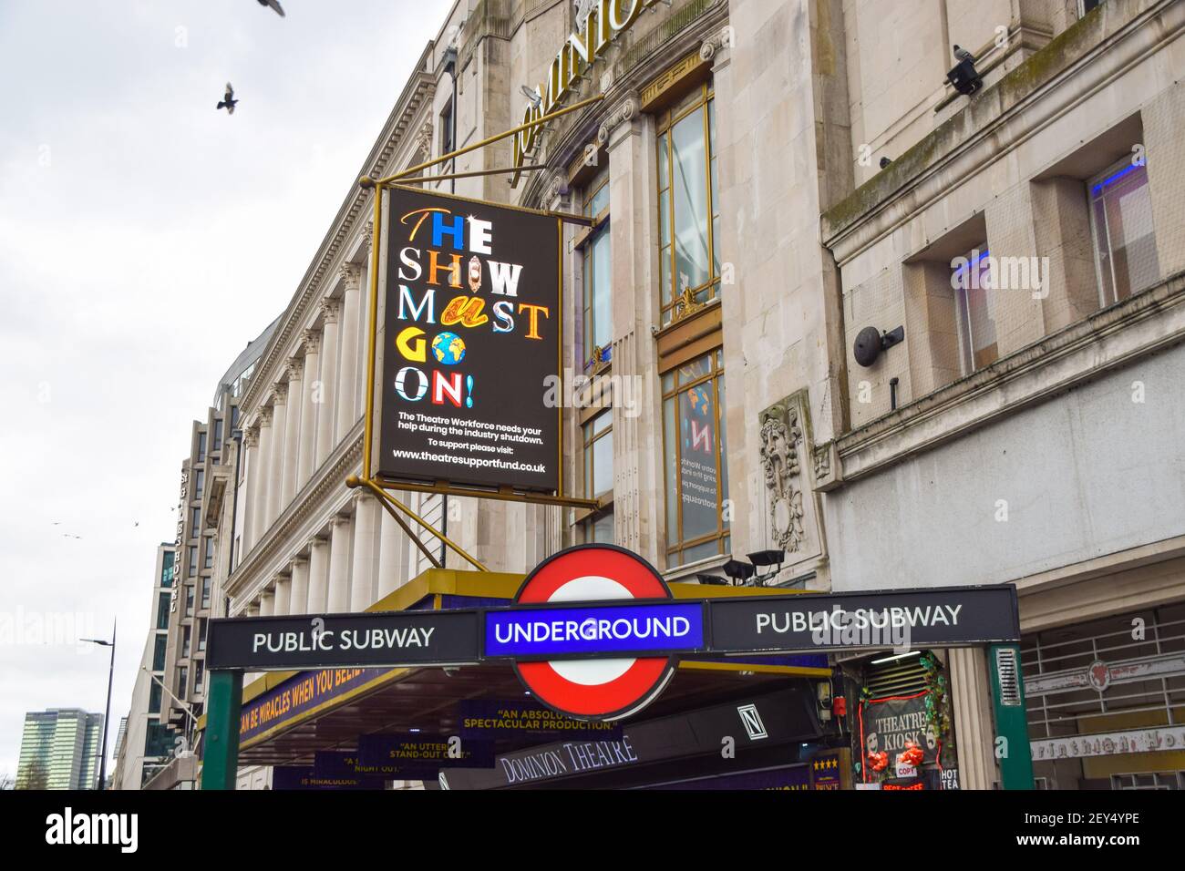 'The Show Must Go On' sign at Dominion Theatre in support of the theatre industry during the coronavirus lockdown. London, United Kingdom 5 March 2021. Stock Photo