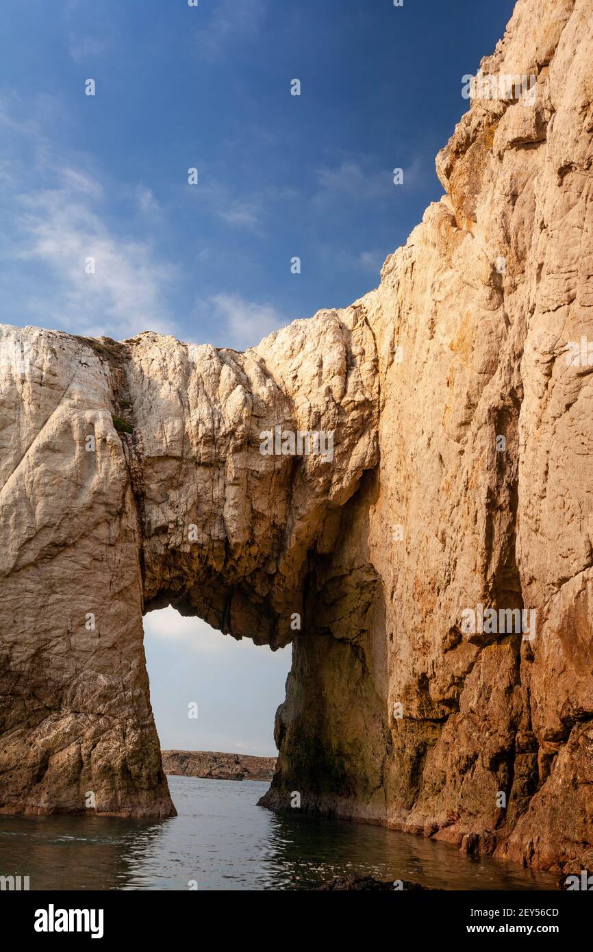 Bwa Gwyn sea arch near Rhoscolyn, Anglesey, North Wales Stock Photo