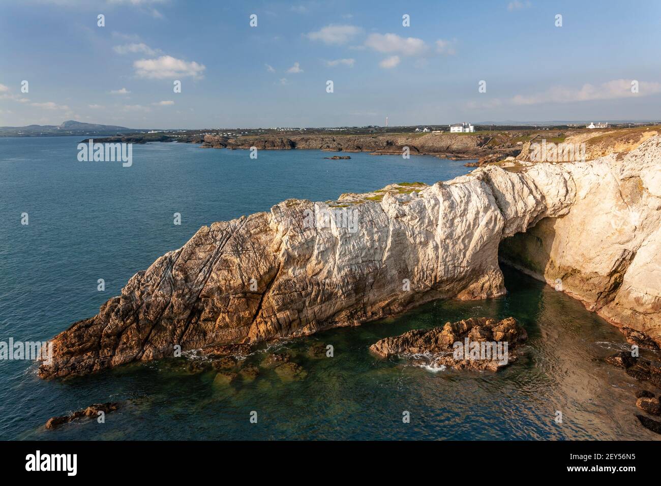 Bwa Gwyn sea arch near Rhoscolyn, Anglesey, North Wales Stock Photo