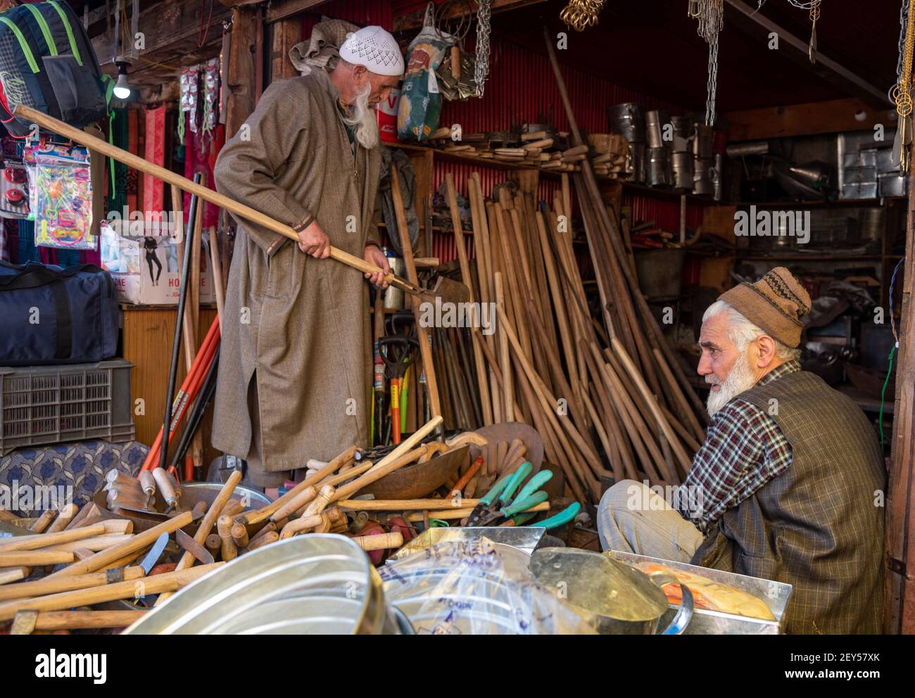 Srinagar, India. 05th Mar, 2021. A Kashmiri man sells iron items and