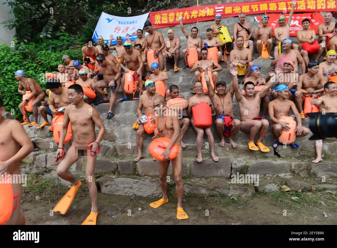 Hundreds of men celebrate the Singles' Day by taking the skinny dipping in  Chongqing, Sichuang,China on 09th November, 2014. (Photo by Top Photo/Sipa  USA Stock Photo - Alamy