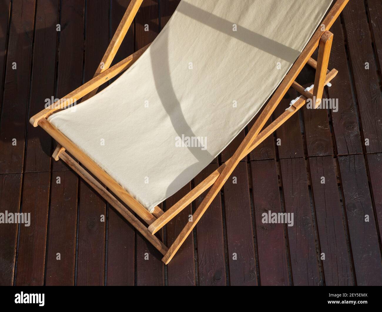 Fabric and wood hammock on parquet floor Stock Photo