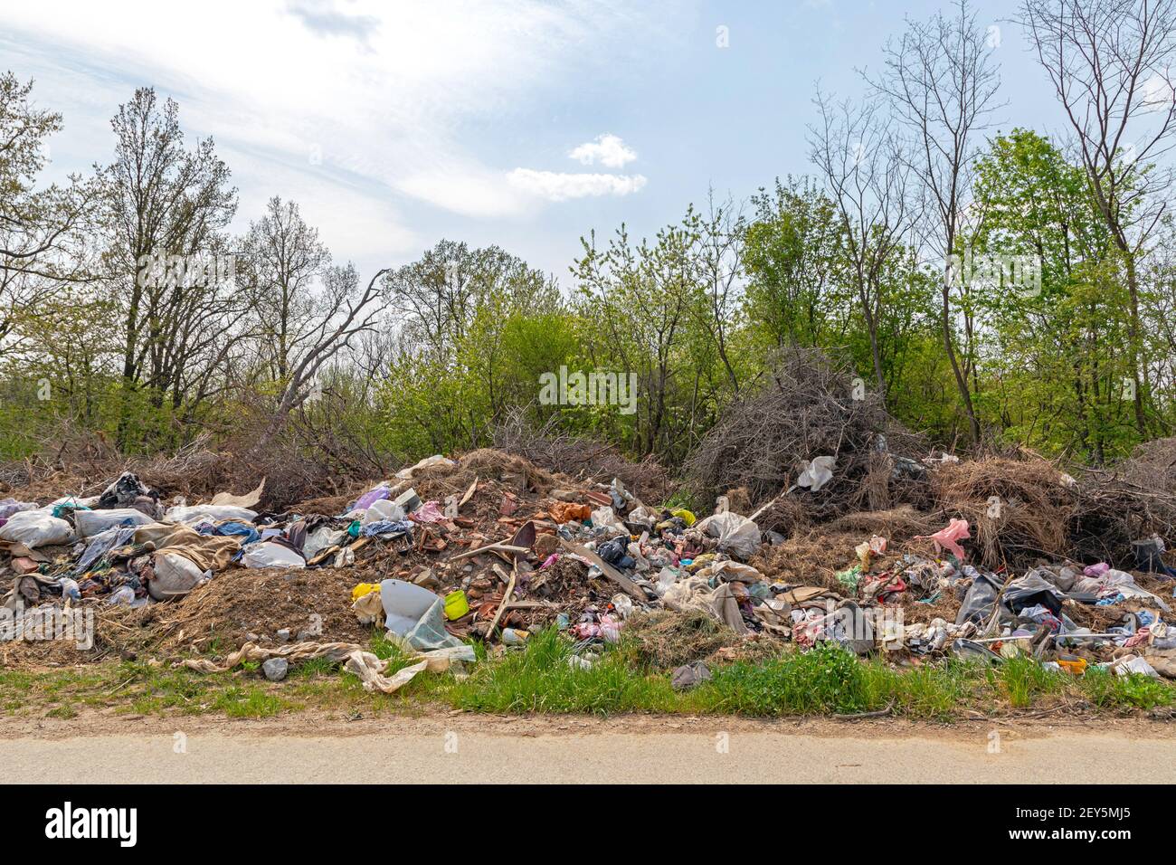 Illegal Dump Site at Side of Road Environment Pollution Problems Stock Photo