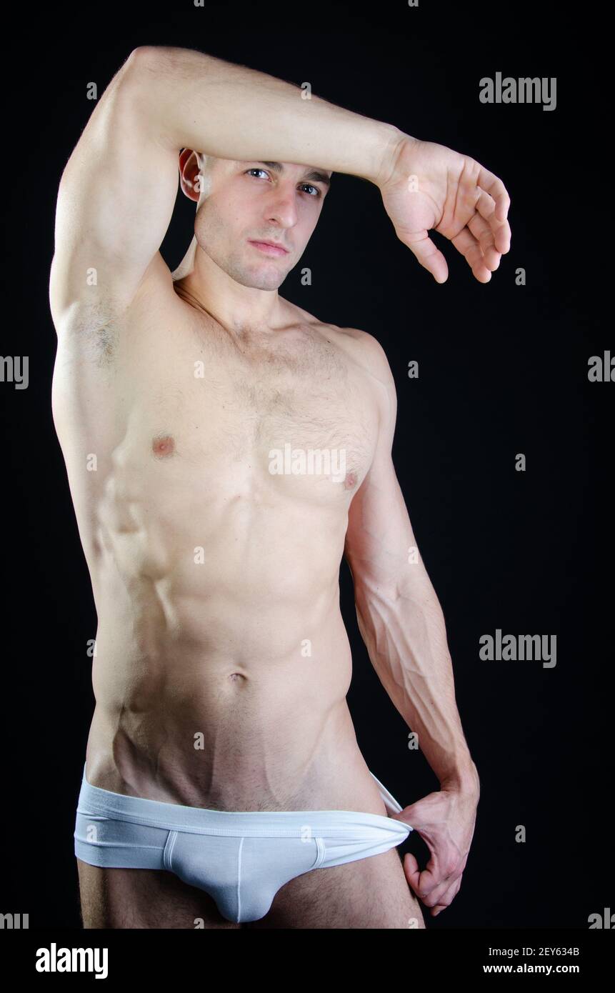 Young attractive guy. Beautiful body. Sexy man Stock Photo - Alamy