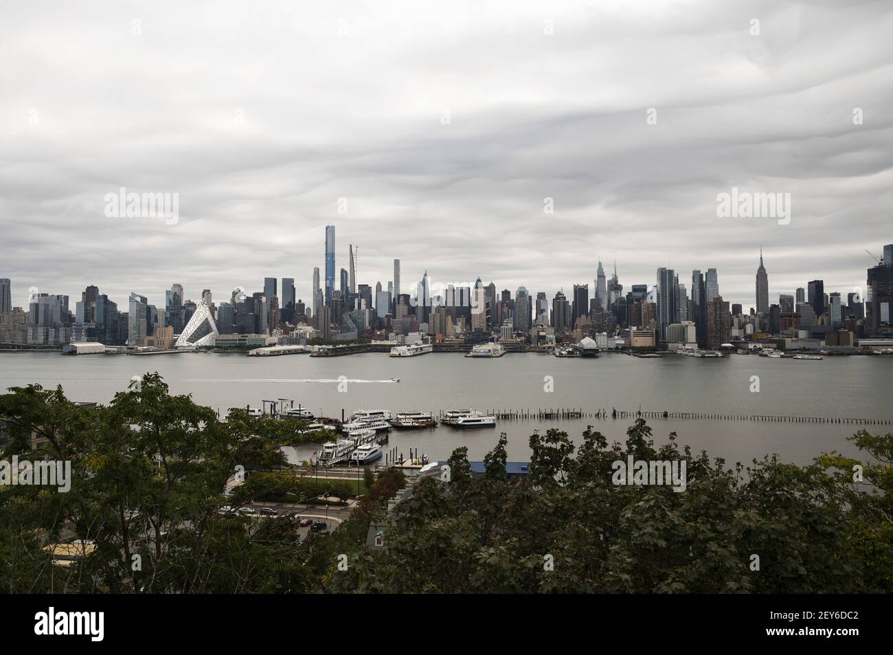 Midtown Manhattan skyline on a cloudy day as seen from the Jersey side of the Hudson River Stock Photo