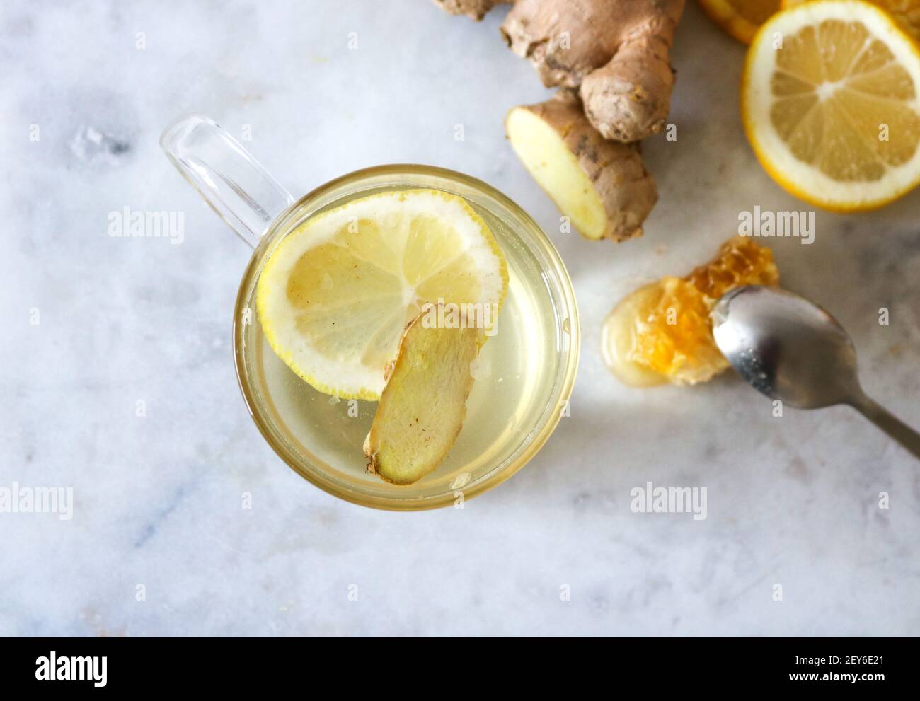 Hot lemon and ginger tea with honey, a great immune system booster and natural cold remedy Stock Photo