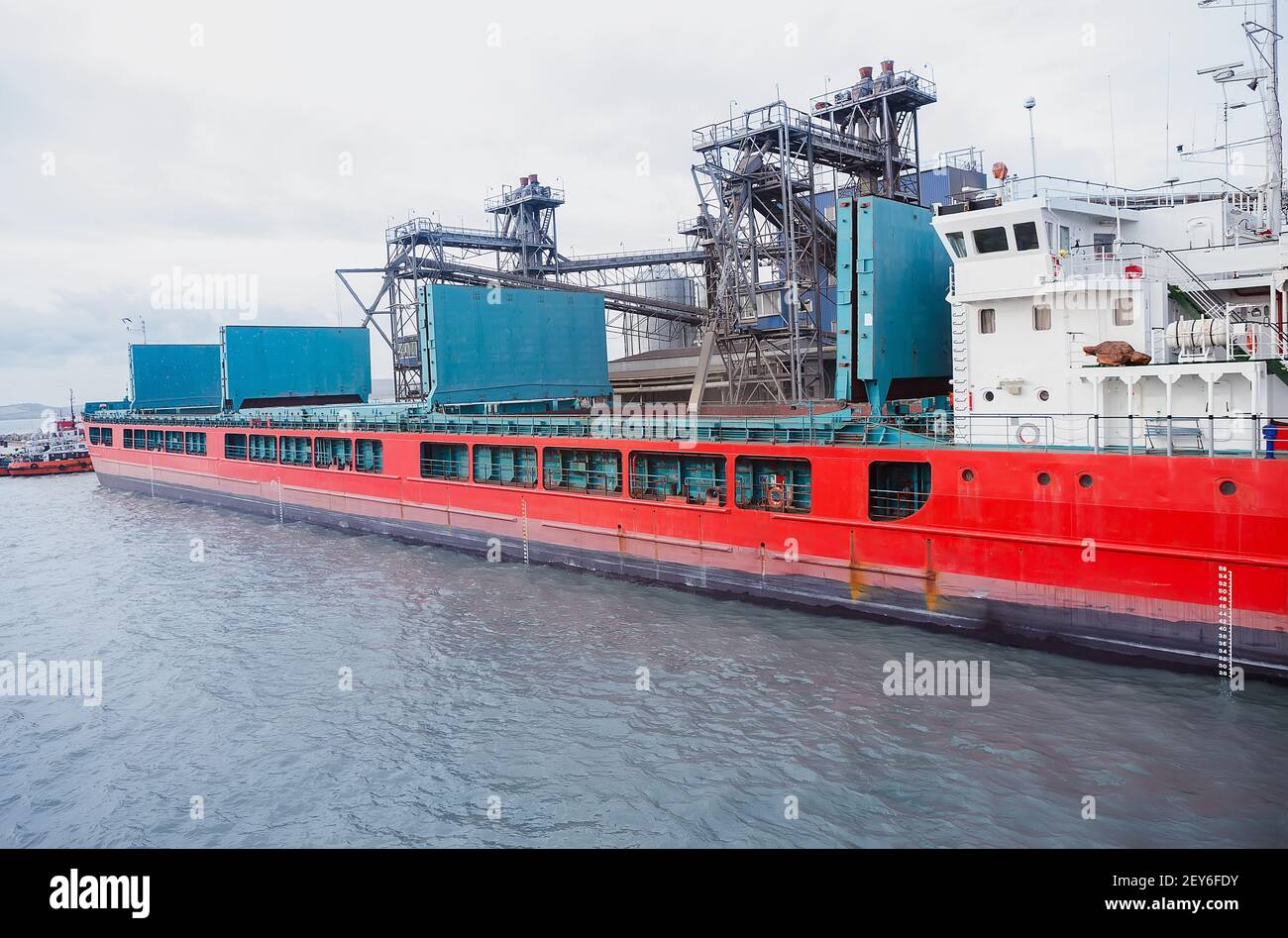 download holds of cargo ship bulk cargo on jetty Stock Photo Alamy
