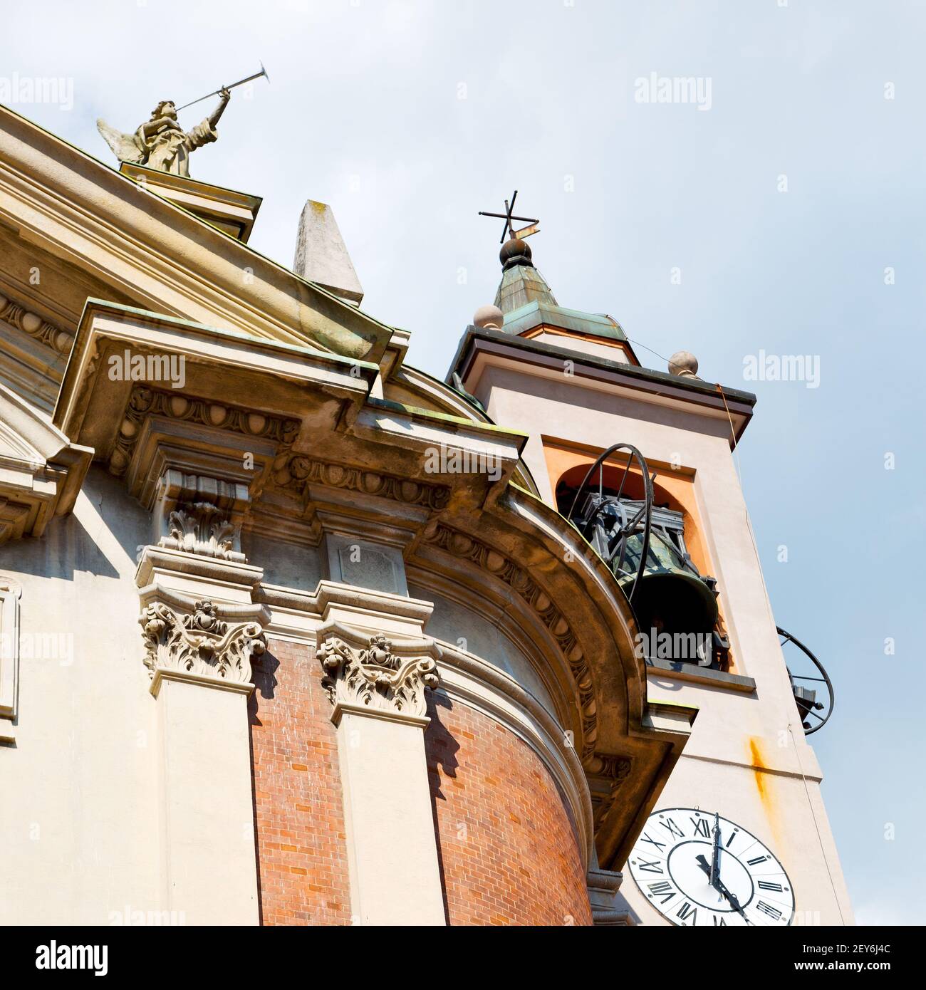 Building clock tower in italy europe old stone and bell Stock Photo - Alamy