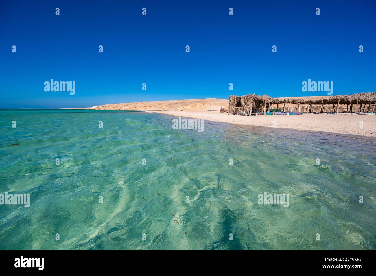Orange Bay with white beach and crystal clear azure water - paradise coastline of Giftun island, Mahmya, Hurghada, Red Sea, Egypt Stock Photo