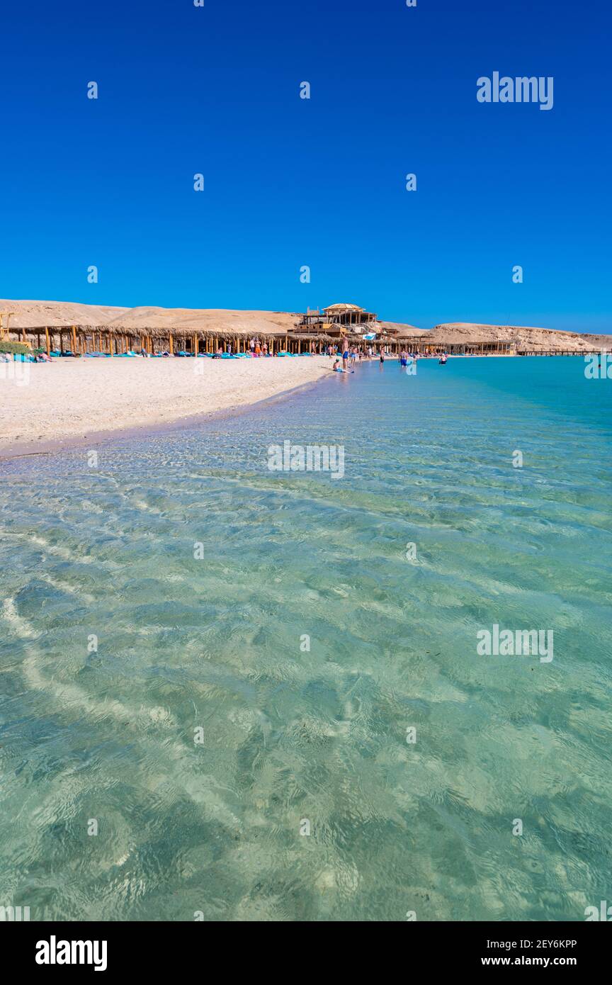 Orange Bay with white beach and crystal clear azure water - paradise coastline of Giftun island, Mahmya, Hurghada, Red Sea, Egypt Stock Photo
