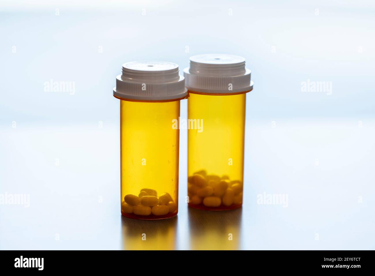 Pill bottles sit on a counter of a pharmacy Stock Photo Alamy