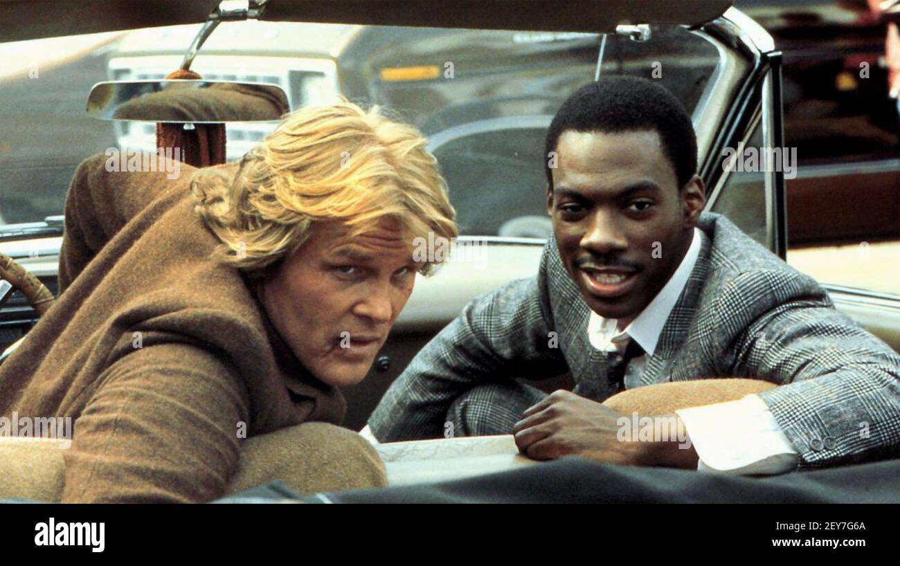 48 HRS  1982 Paramount Pictures film with Nick Nolte at left as Inspector Jack Cates and Eddie Murphy as Reggie Hammond Stock Photo