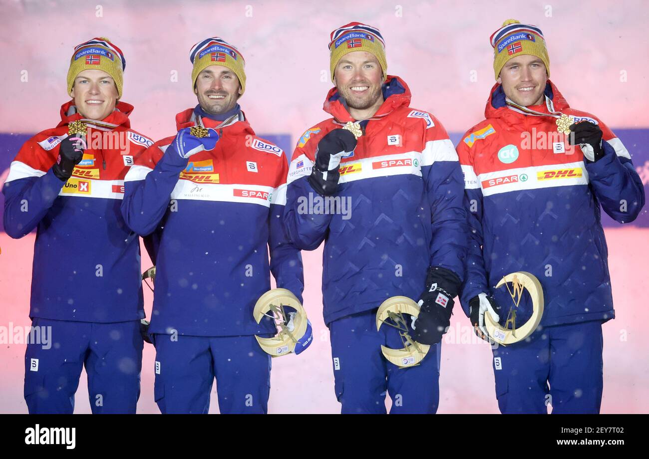 Oberstdorf, Germany. 05th Mar, 2021. Nordic skiing: World Championships, cross-country skiing - relay 4 x 10 km, men, award ceremony: The relay team from Norway (Paal Golberg, Emil Iversen, Hans Christer Holund, Johannes Hoesflot Klaebo) cheers with the gold medals on the podium. Credit: Karl-Josef Hildenbrand/dpa/Alamy Live News Stock Photo