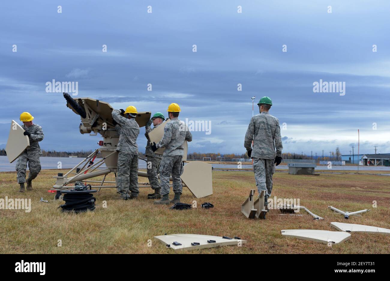 U.S. Airmen with the 52nd Combat Communications Squadron work together