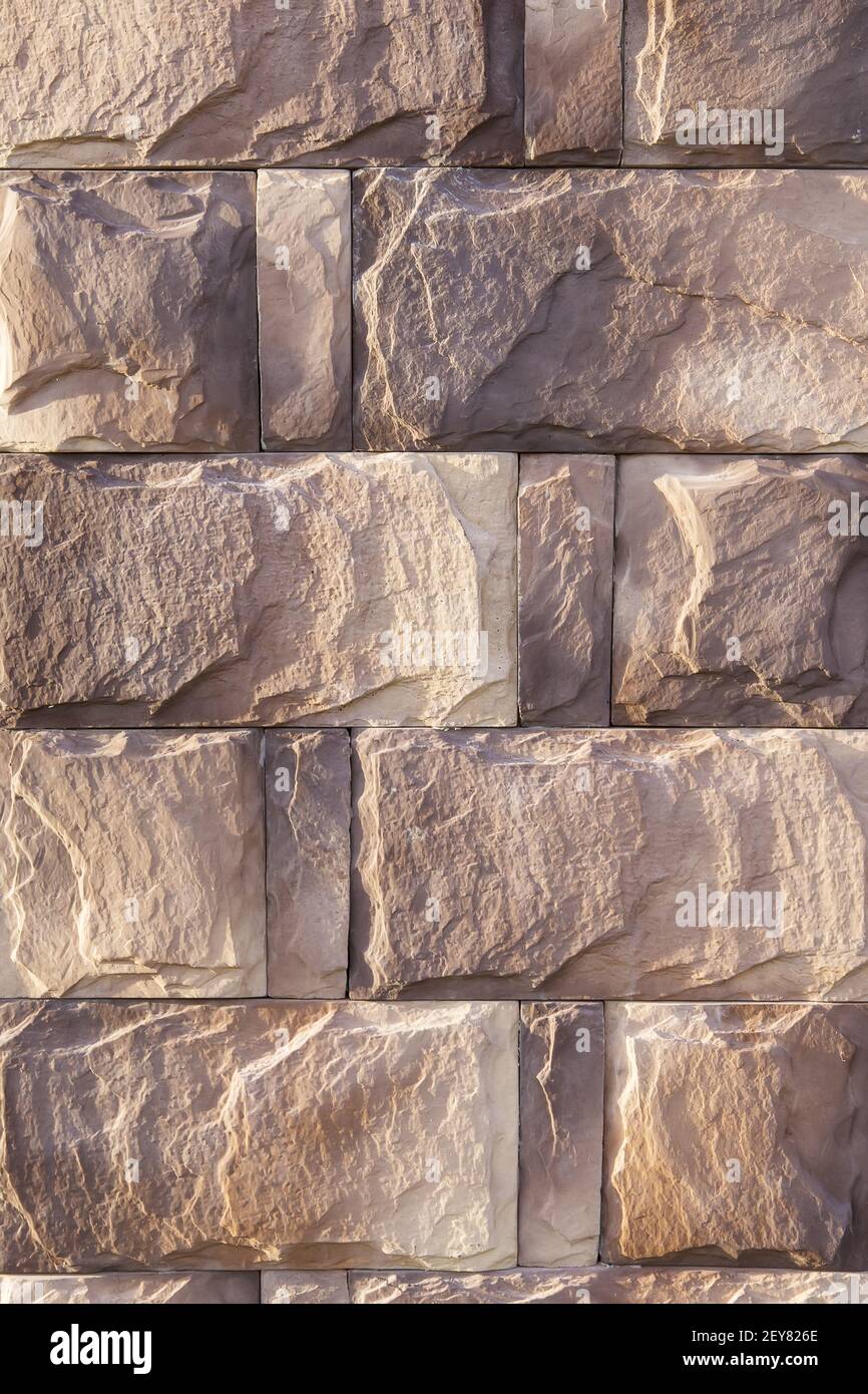 stone wall and rectangular granite blocks background Stock Photo