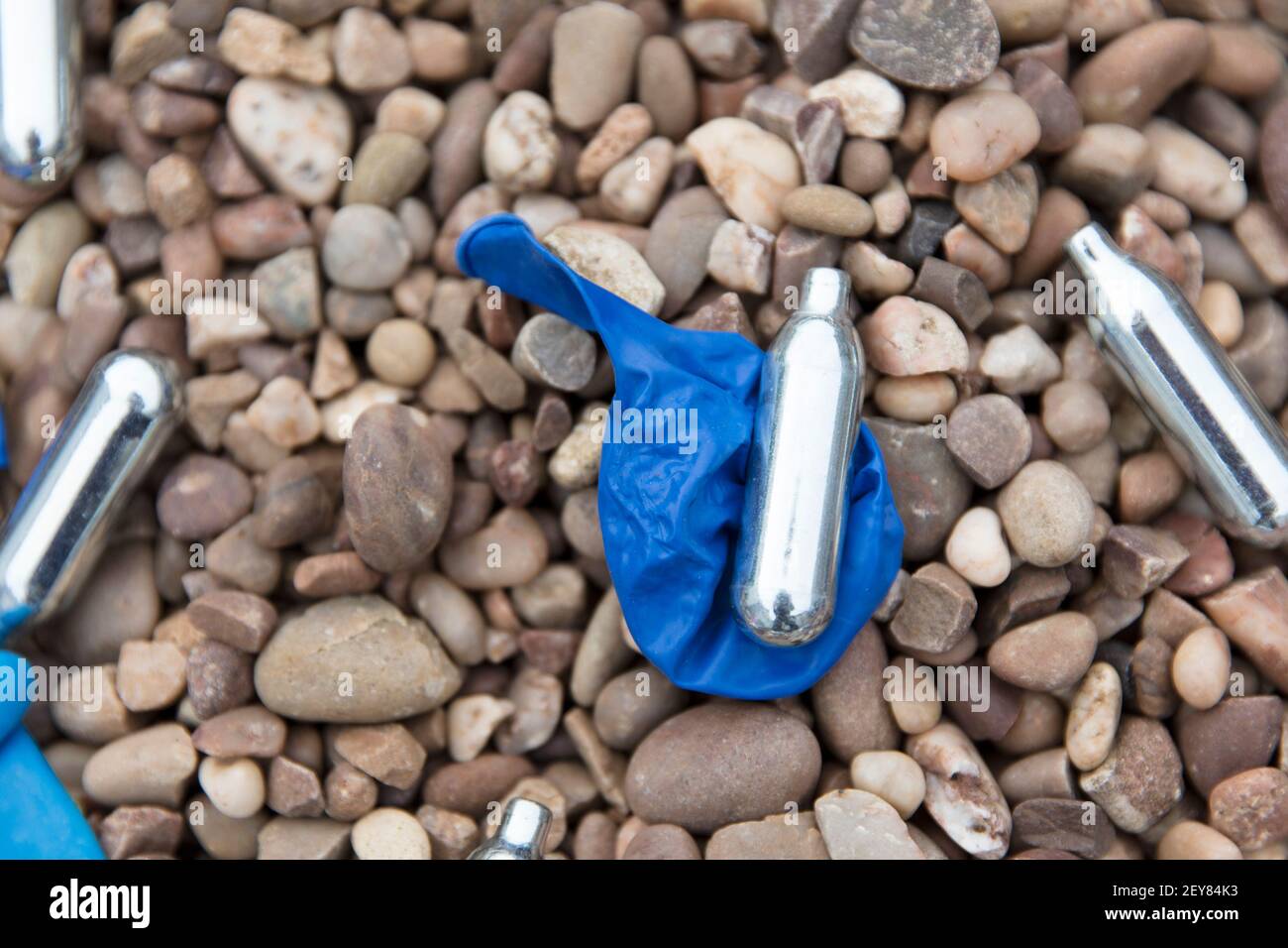 Nitrous oxide metal bulbs or laughing gas recreational drug use Stock