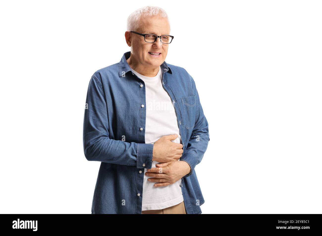 Mature man holding his stomach and experiencing pain isolated on white background Stock Photo
