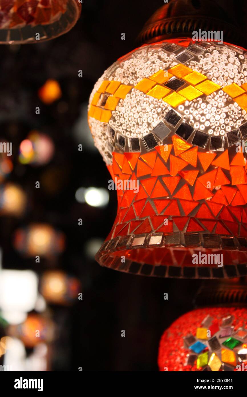 folkloristic colorful glass mosaic lamp in the dark of a Sarajevo market Stock Photo