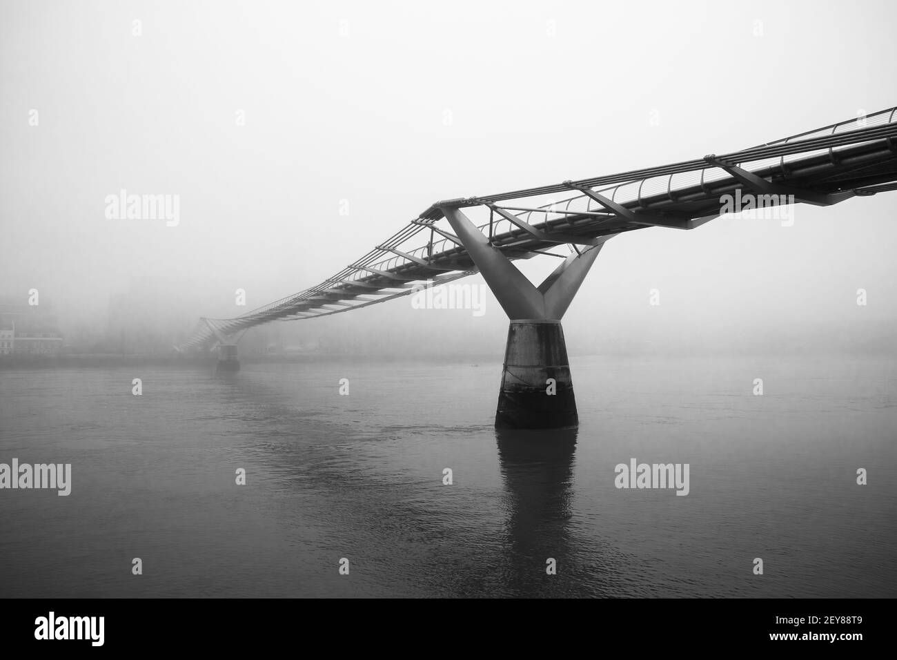 London's Millennium Bridge on a foggy morning Stock Photo