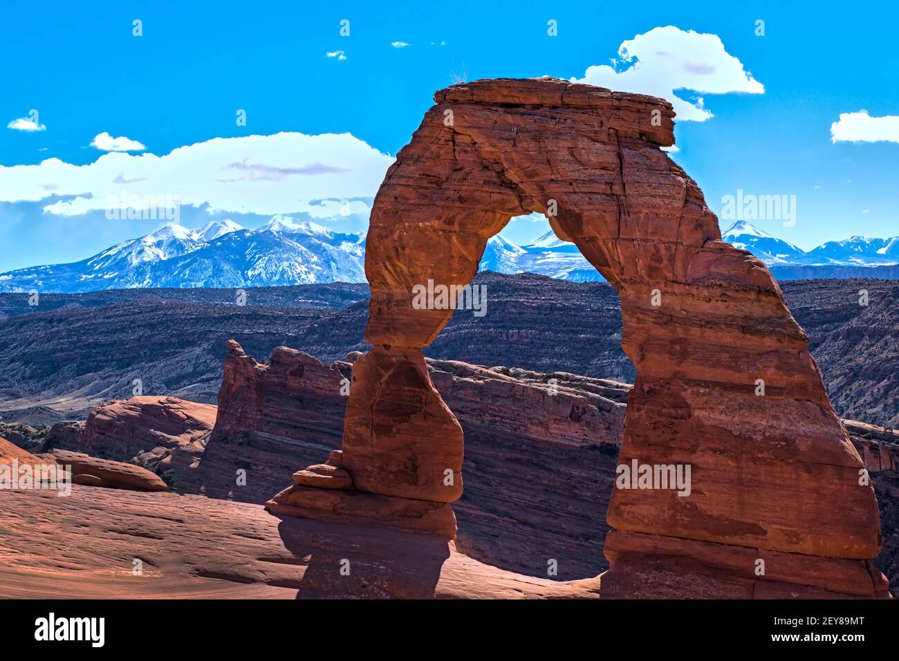 Arches national park on sunny day blue sky clouds travel destination tourist spot southwest high alpine desert america scenic destination spot. Stock Photo