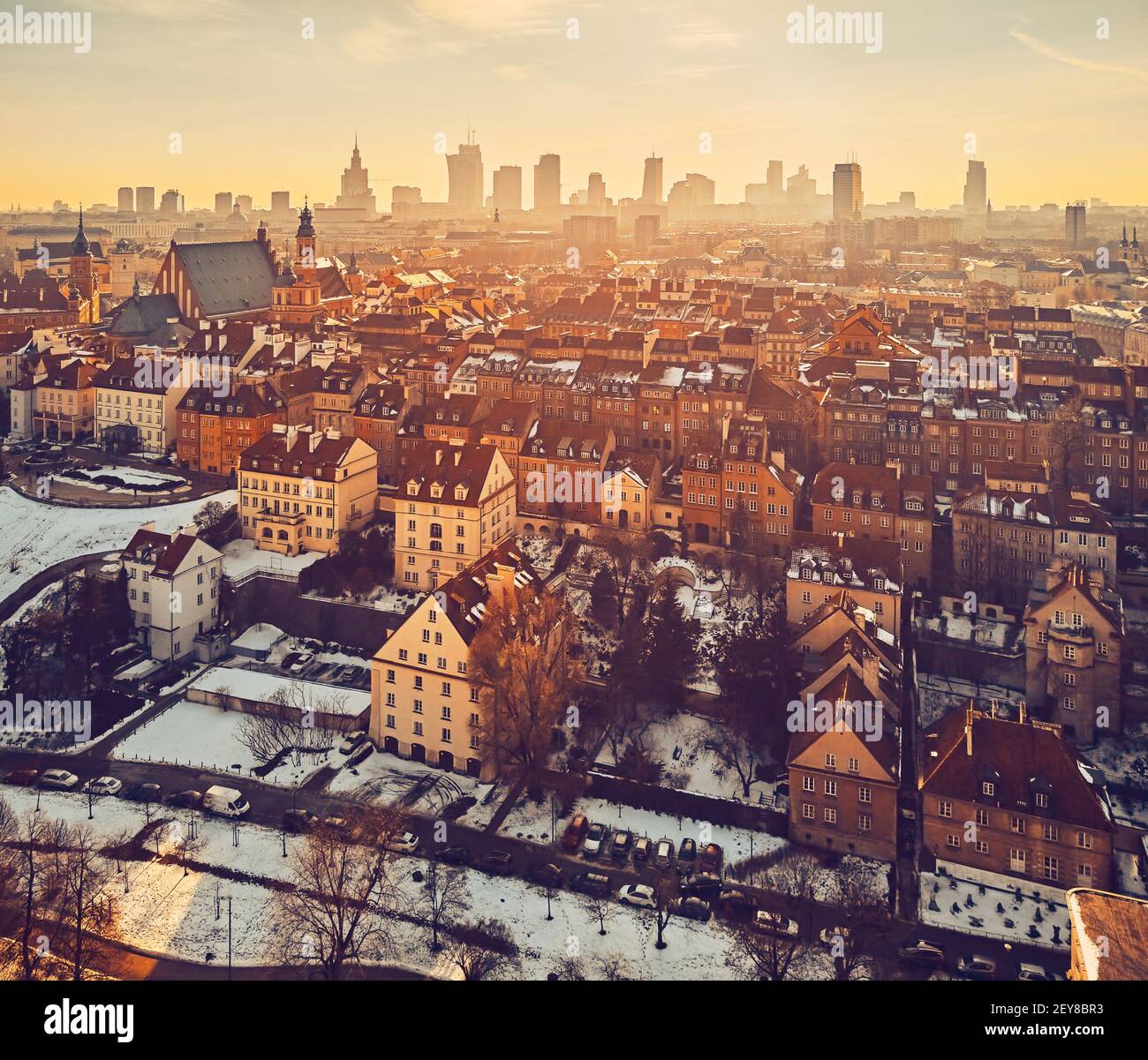 Beautiful panoramic aerial drone skyline sunset view of the Warsaw City Centre with skyscrapers of the Warsaw City and Warsaw's old town with a market Stock Photo