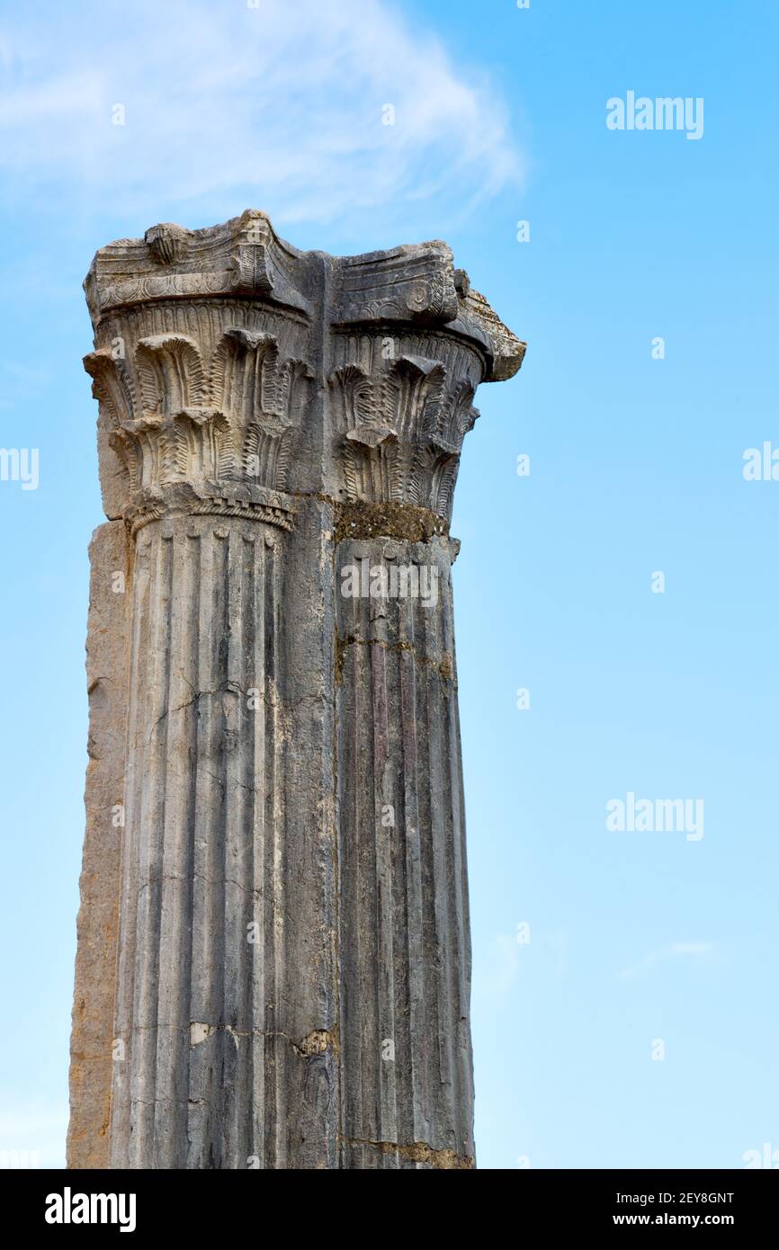 Old column in the africa sky history and nature Stock Photo - Alamy
