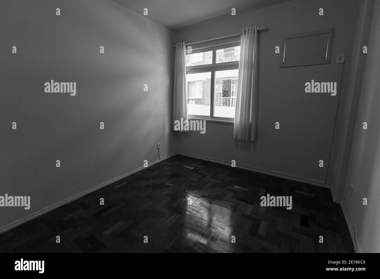 An empty apartment room interior with casement windows Stock Photo