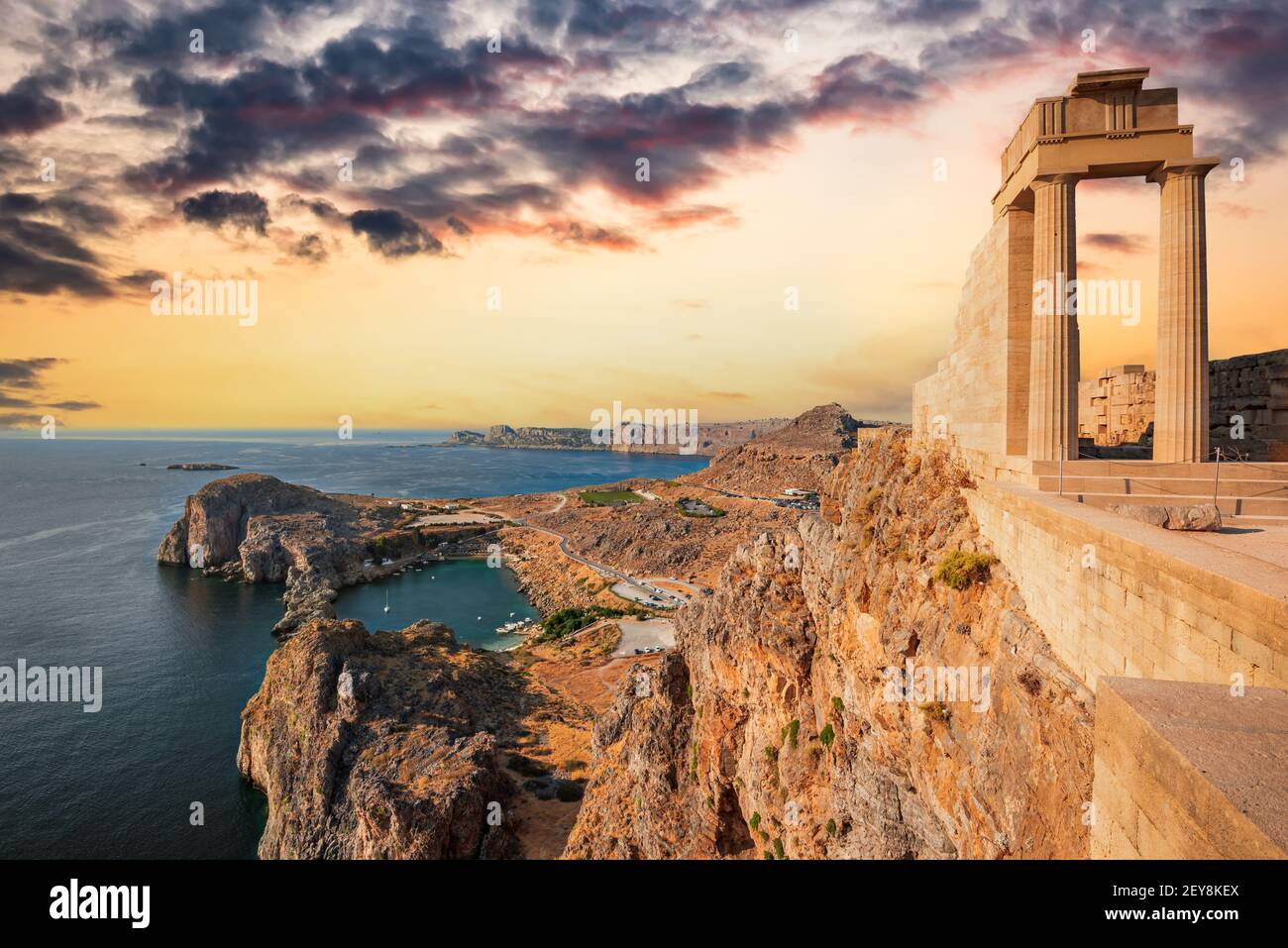 Rhodes, Greece. Lindos small whitewashed village and the Acropolis, scenery of Rhodos Island at Aegean Sea. Stock Photo