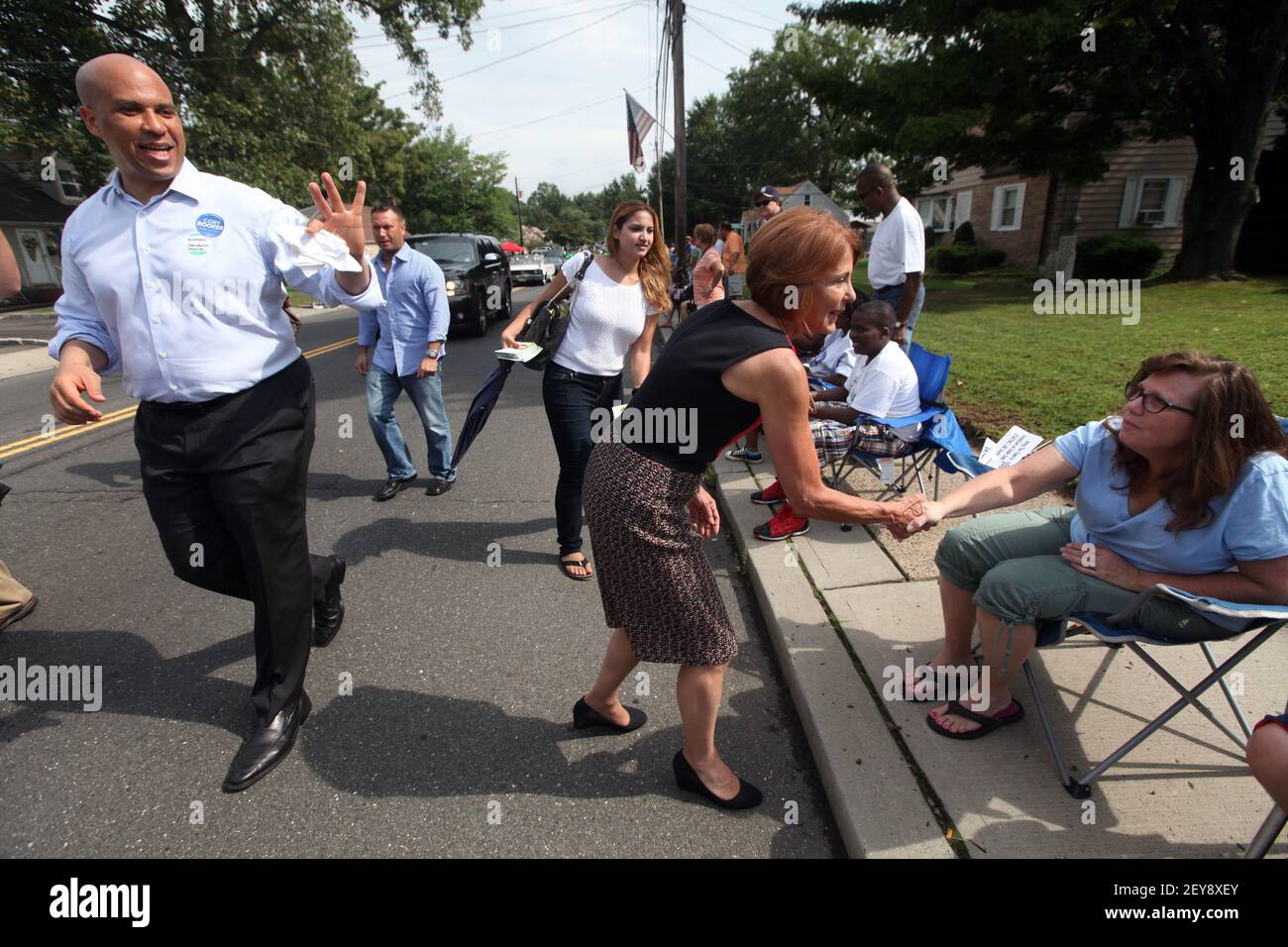September 2, 2013; South Plainfield, NJ, USA; Candidates for elected office came to the South Plainfield annual Labor Day Parade to campaign for votes. Cory Booker following candidate for Governor Barbara Buono along the parade route. Mandatory Credit: Chris Pedota/The Record via USA TODAY NETWORK/Sipa USA Stock Photo