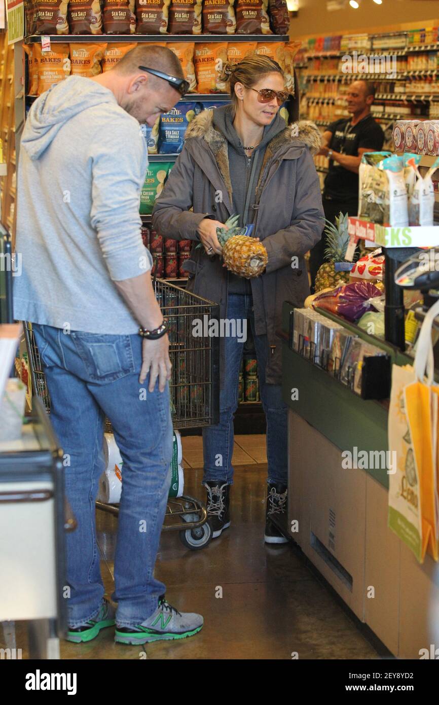 5 January 2013 - Los Angeles, CA - Heidi Klum and boyfriend Martin Kristen stock up on food and wine at Whole Foods in Brentwood. Earlier the couple took Heidi's kids to Starbucks for an early morning coffee. Photo Credit: CAD/Sipa USA Stock Photo