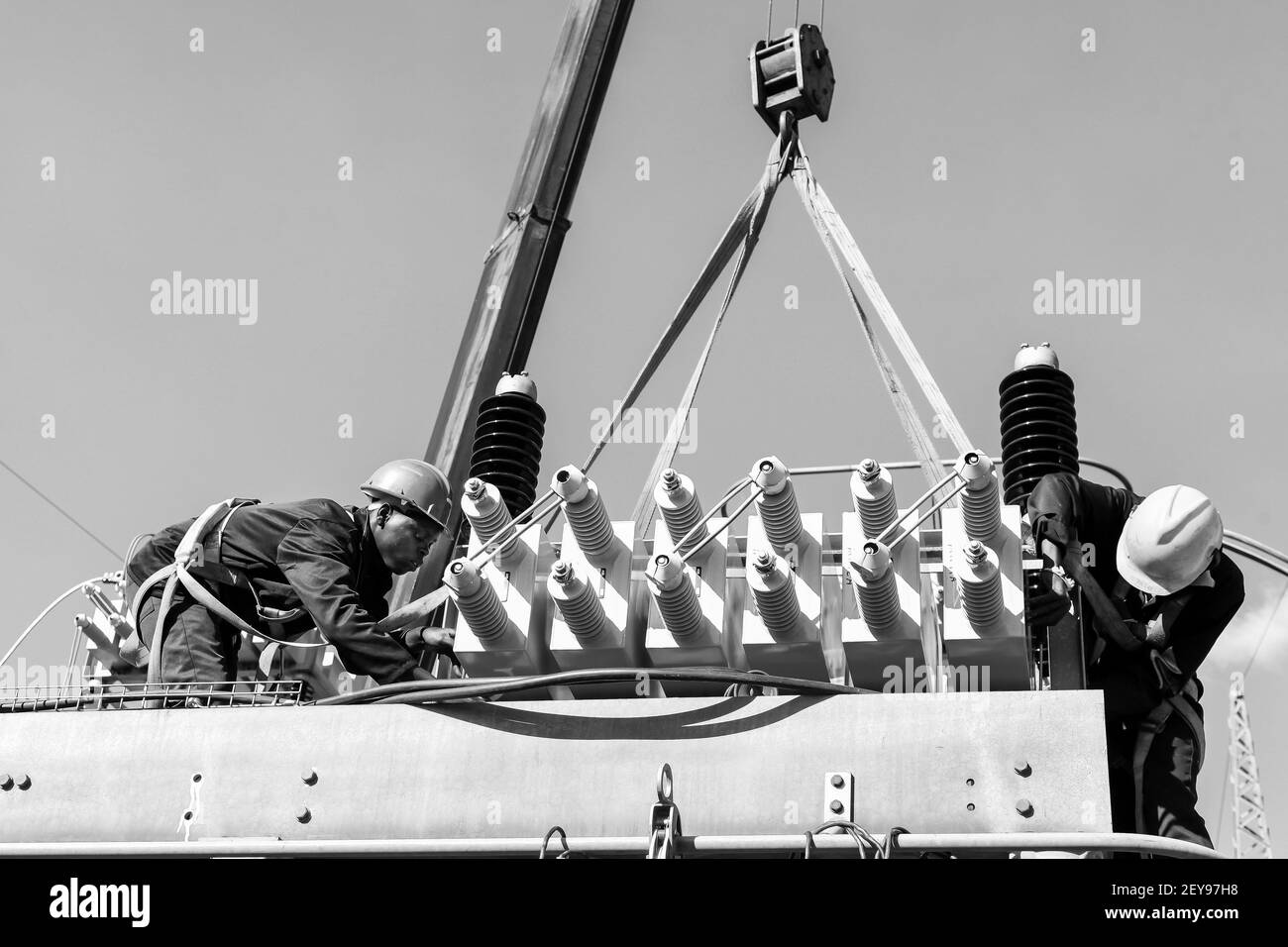 JOHANNESBURG, SOUTH AFRICA - Jan 06, 2021: Johannesburg, South Africa, 04/11/2012, Electricians working on high voltage power lines. Highly skilled wo Stock Photo