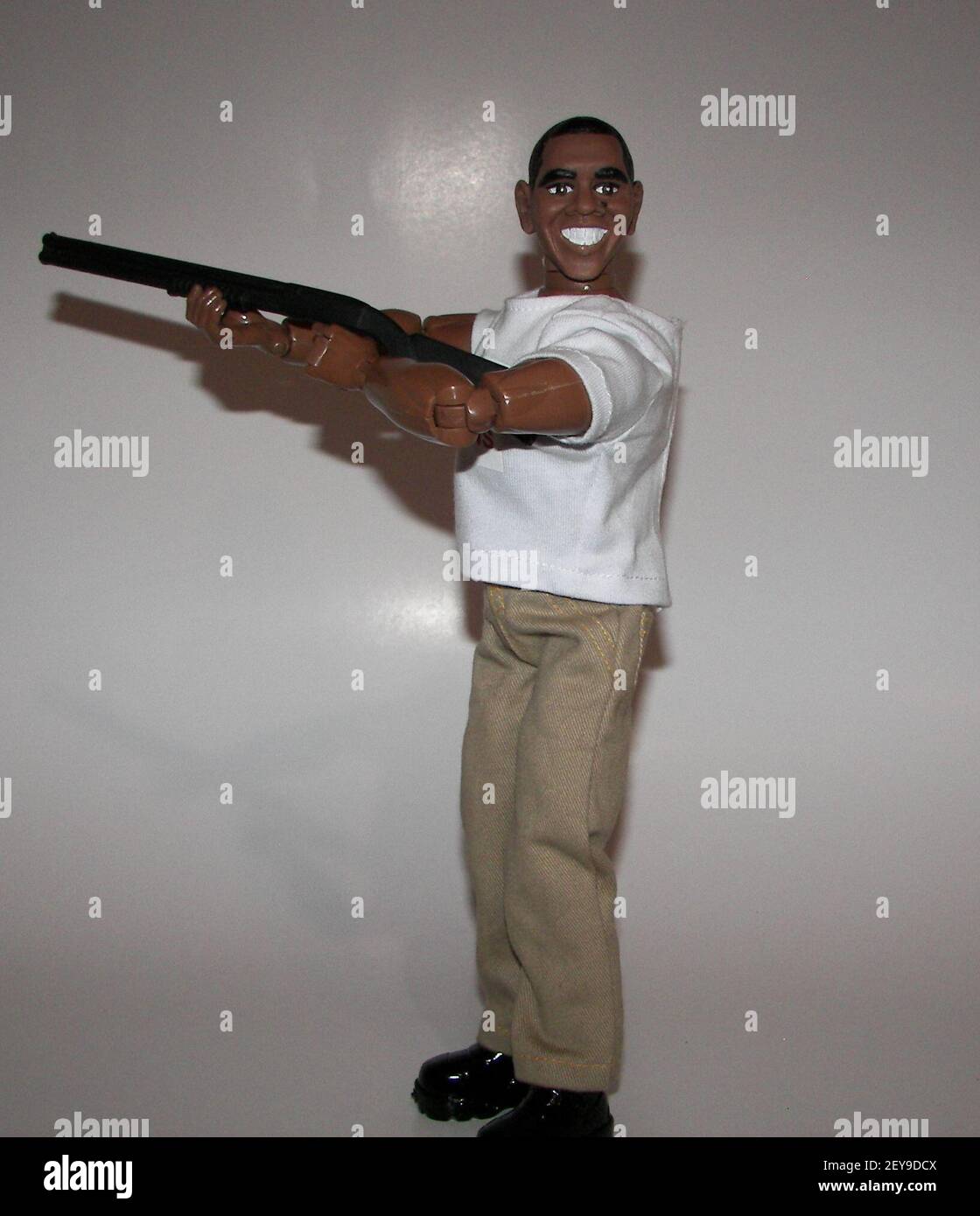4 February 2013 - Herobuilders toy company created the Obama Skeet Shooting President Action Figure after the White House released a photo of President Obama shooting skeet at Camp David. The White House decided to release the photo in order to answer calls that he had exaggerated about his firearm usage in an interview with the New Republic. Handout photo. Credit: Sipa USA Stock Photo