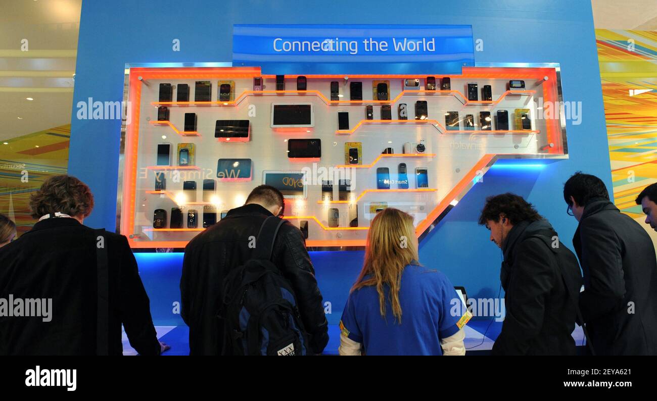 Feb 25, 2013 - Barcelona, Spain - In this handout photo released by Intel Corporation, Intel displays a broad range of mobile devices at Intel's booth at Mobile World Congress 2013, Monday, February 25, 2013 in Barcelona, Spain. Intel is a leading provider of cellular platforms, and its technology is inside hundreds of millions of popular devices worldwide. Mobile World Congress is one of the largest annual gatherings of over 60,000 mobile leaders from 200 countries to one place at one time to define the mobile future. Photo Credit: Bob Riha, Jr./Intel/Sipa USA Stock Photo