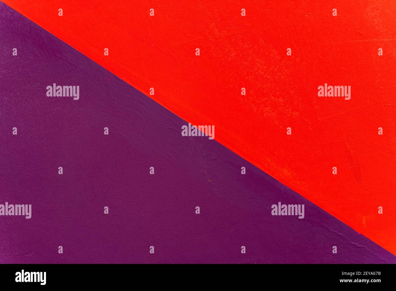rough wall with half red and half purple Stock Photo Alamy