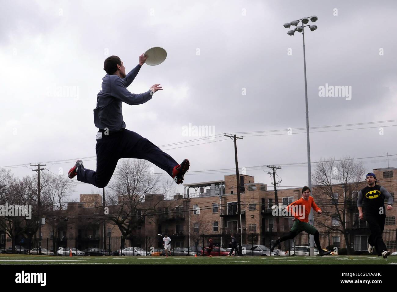 Feb 16, 2013 - WASHINGTON, DC - Gabe Webster, left, leaps into the air to  catch a pass during tryouts for the D.C. Breeze, a new ultimate Frisbee  professional team, at Woodland