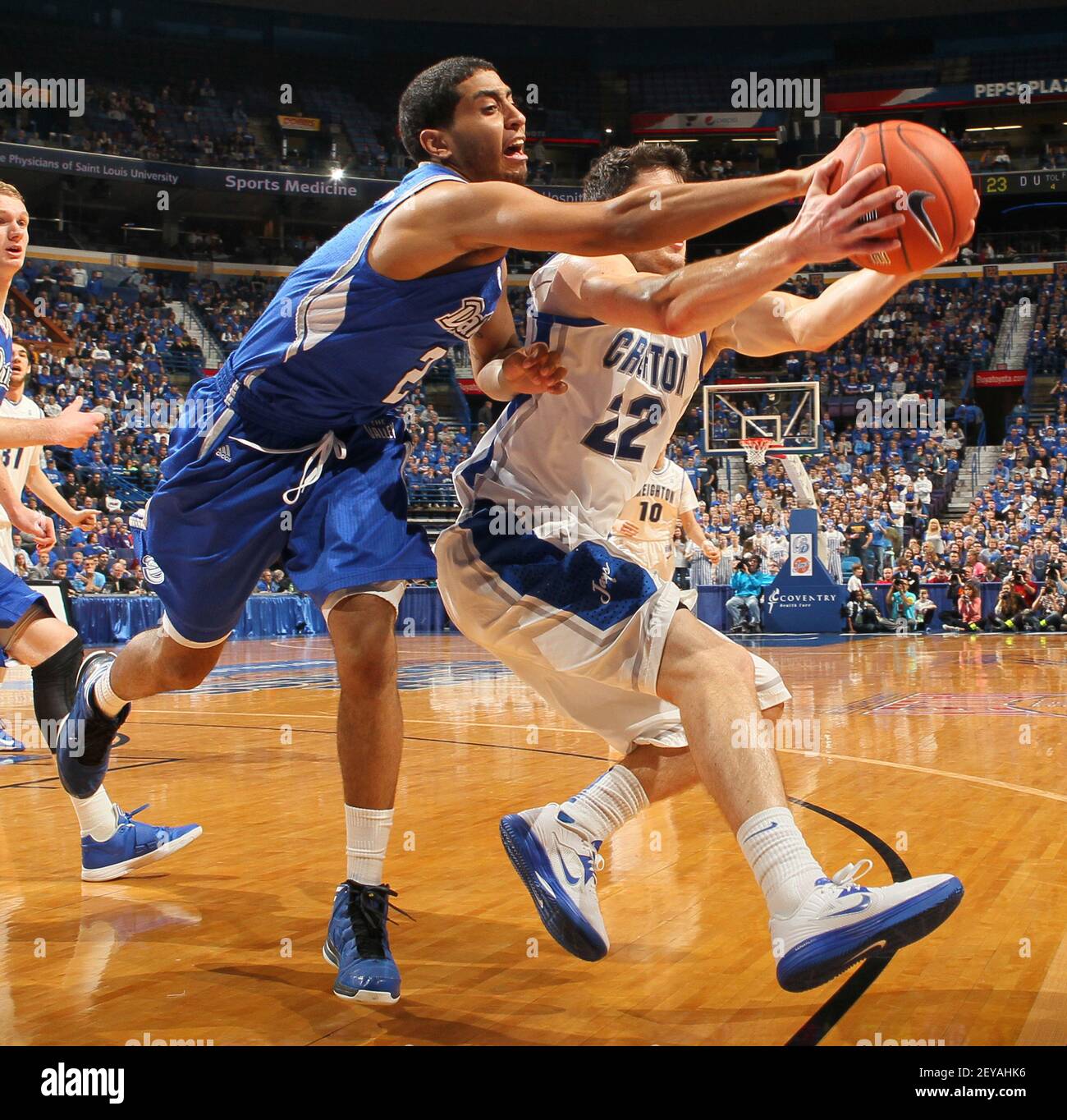 Gary Ricks Gary Ricks Jr. of Drake, left, goes for a ball against Avery Dingman of ...