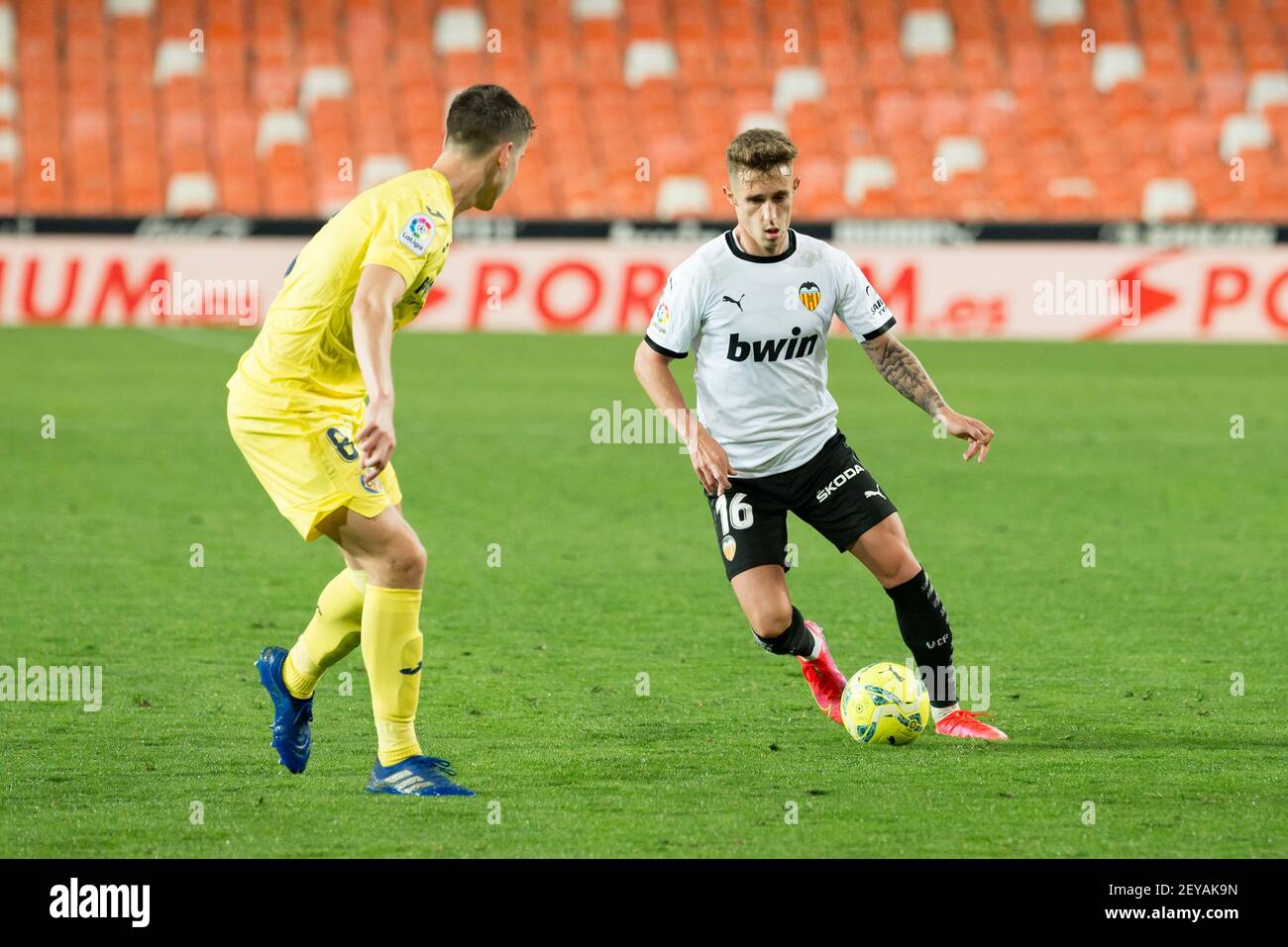 Valencia, Spain. 05th Mar, 2021. Alex Blanco of Valencia CF and Juan Foyth of Villarreal CF in action during the Spanish La Liga football match between Valencia CF and Villarreal CF at Estadio Mestalla.Final score; Valencia CF 2:1 Villarreal. Credit: SOPA Images Limited/Alamy Live News Stock Photo