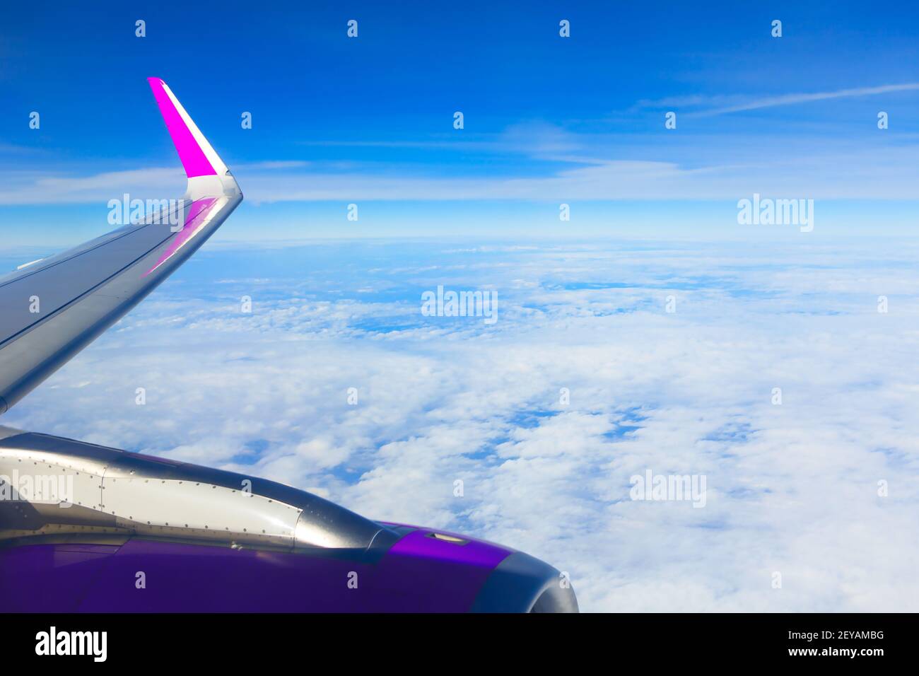 Aircraft wing during the flight . View from airplane window Stock Photo
