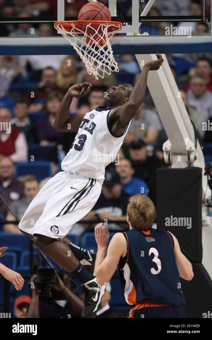 Butler forward Khyle Marshall, left, dunks in the first half of the men