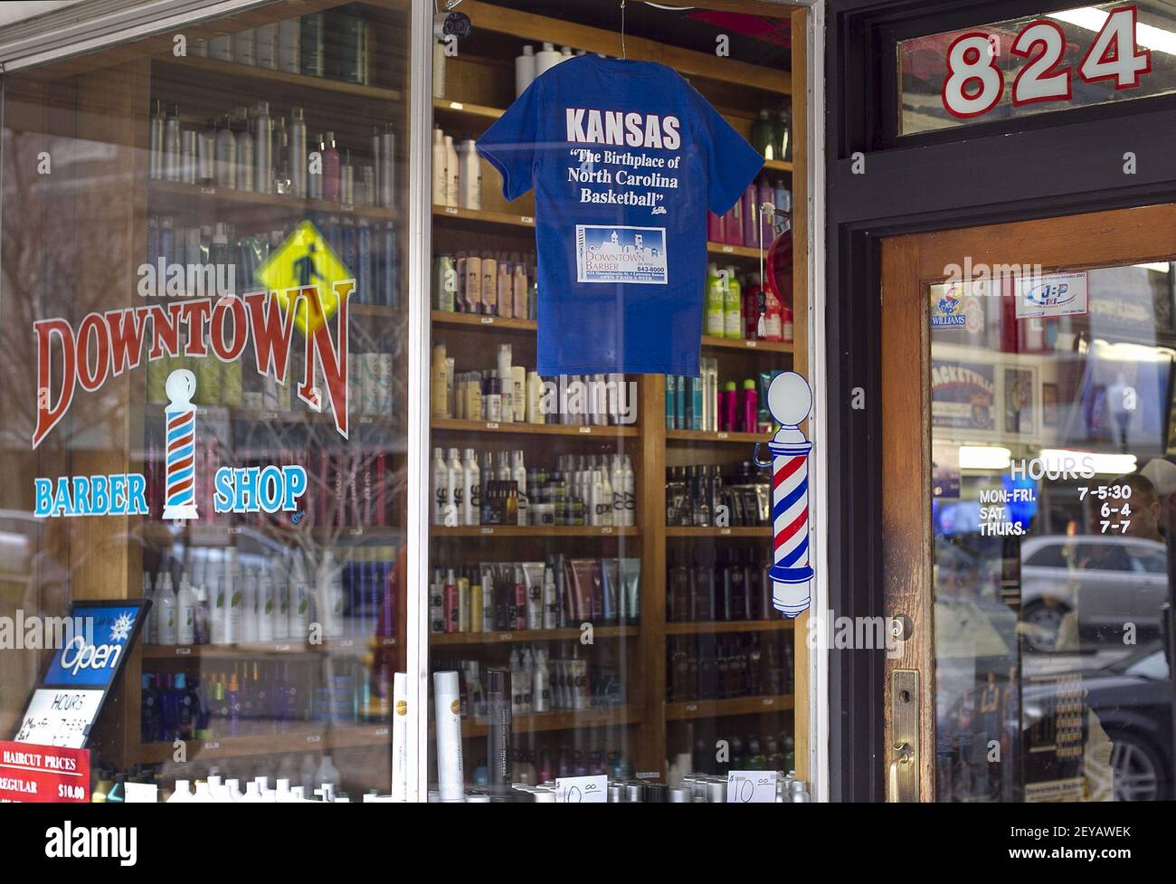 A tshirt on the window of the Downtown Barber Shop in Lawrence, Kansas